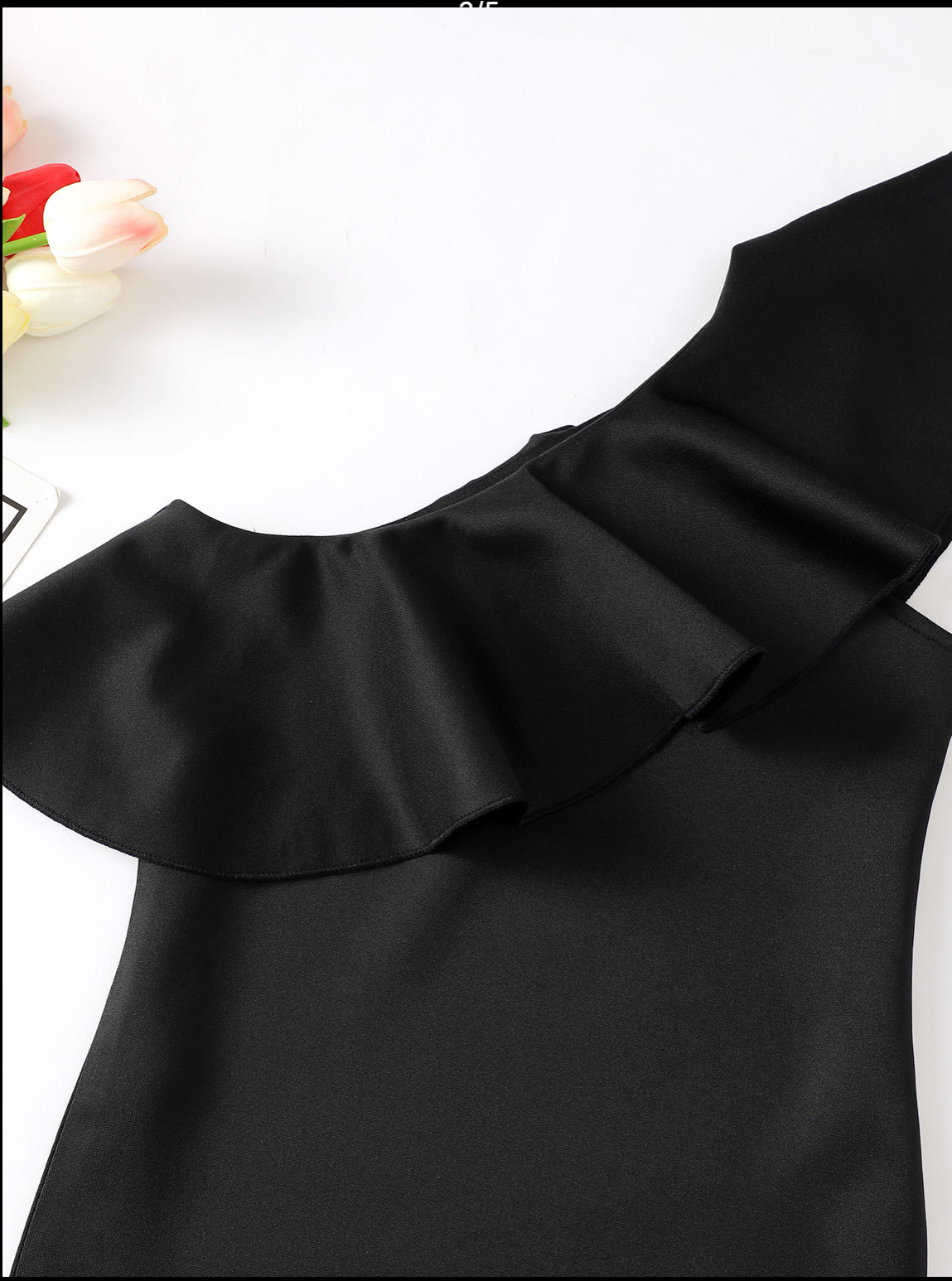 One-shoulder black ruffle dress