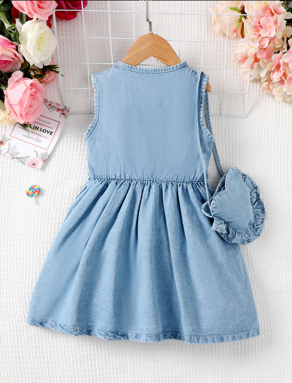 Adorable sleeveless denim dress for girls, complete with a matching ruffle purse!